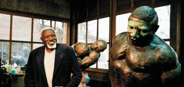 Ousmane Sow med en af sine udtryksfulde skulpturer