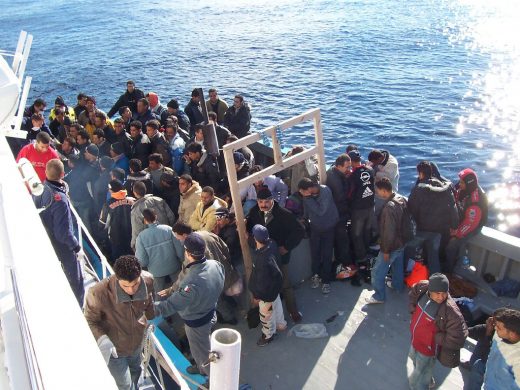 boat_people_at_sicily_in_the_mediterranean_sea