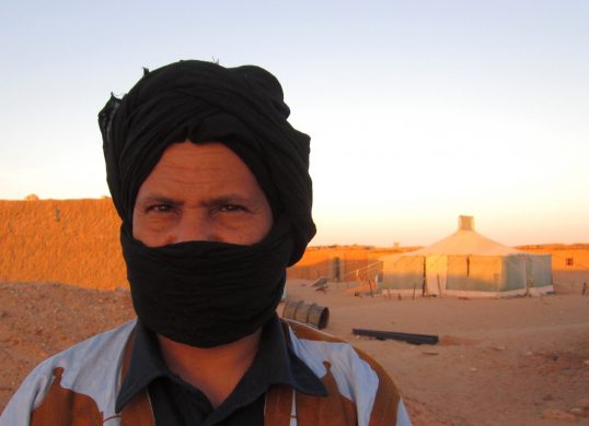 abba_malainin_outside_his_mothers_house_in_the_auserd_efugee_camp_-_photo_by_peter_kenworthy