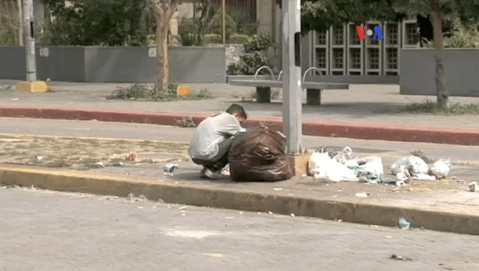 1200px-venezuela_shortages_-_eating_garbage_1_voa