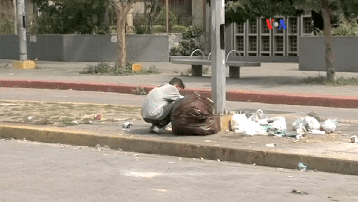 1200px-venezuela_shortages_-_eating_garbage_1_voa
