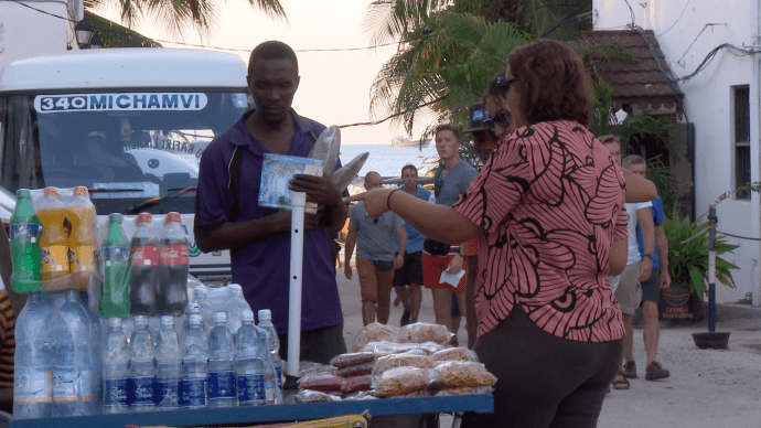 street_vendor_selling_plastic_bottles